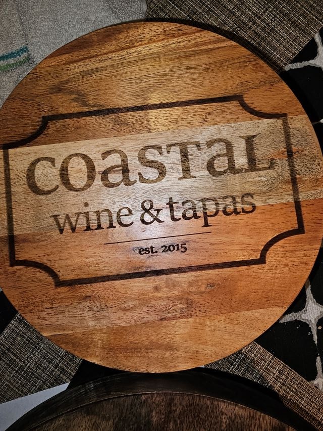 Coastal Wine & Tapas circular laser engraved wood sign