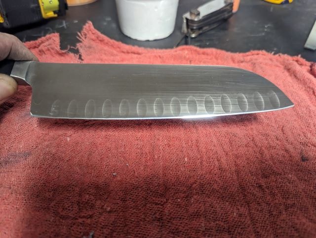 Santoku chef knife blade freshly sharpened and polished